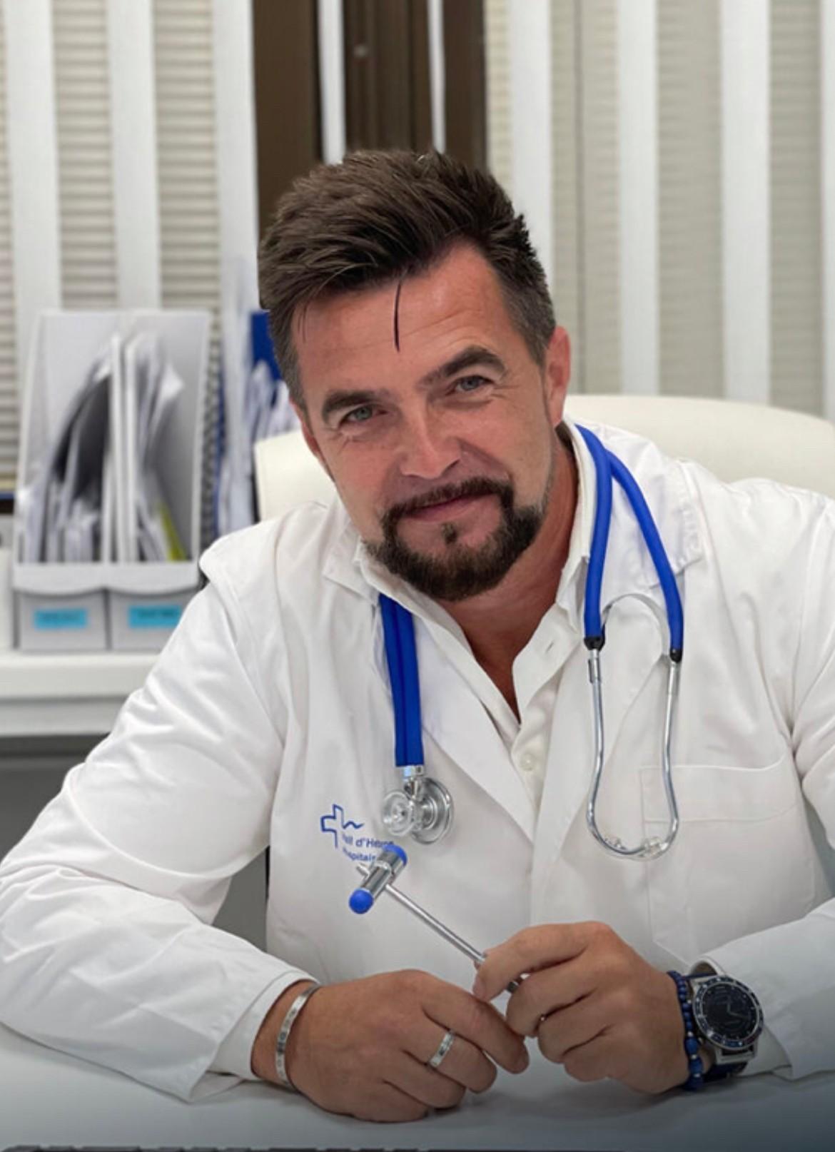 A doctor in his practice